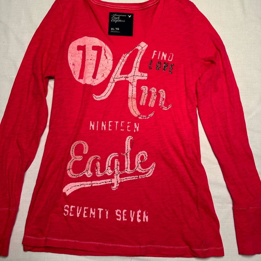 American Eagle. Bright Pink, long sleeve, V-neck t shirt with beading.